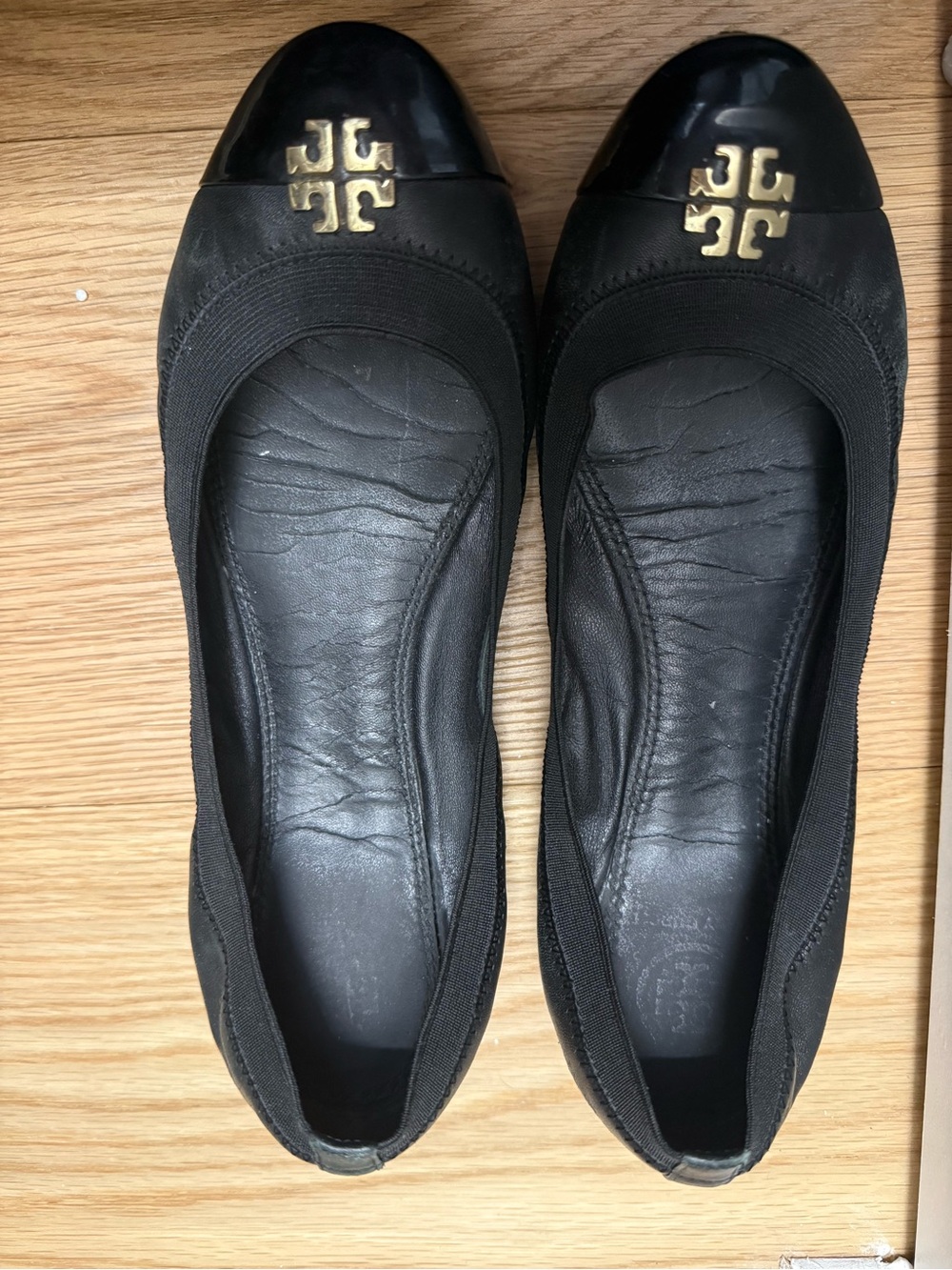 Tory Burch Black Flats with Gold Emblem